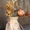lechera vintage con flores decorativas